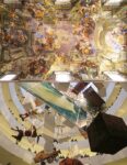 Andrea Pozzo, Gloria di Sant'Ignazio, 1685. Chiesa di Sant'Ignazio di Loyola, Roma _ Maurizio Cattelan. All. Exhibition view at Solomon R. Guggenheim Museum, New York 2011