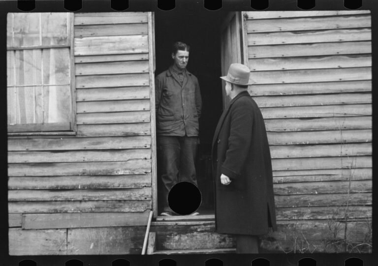 Theodor Jung Untitled photo, possibly related to: Resettlement Administration representative at door of rehabilitation client's house, Jackson County, Ohio April 1936 Digital print from scanned 35mm b&w negative Courtesy line