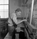 Anni Albers in her weaving studio at Black Mountain College, 1937