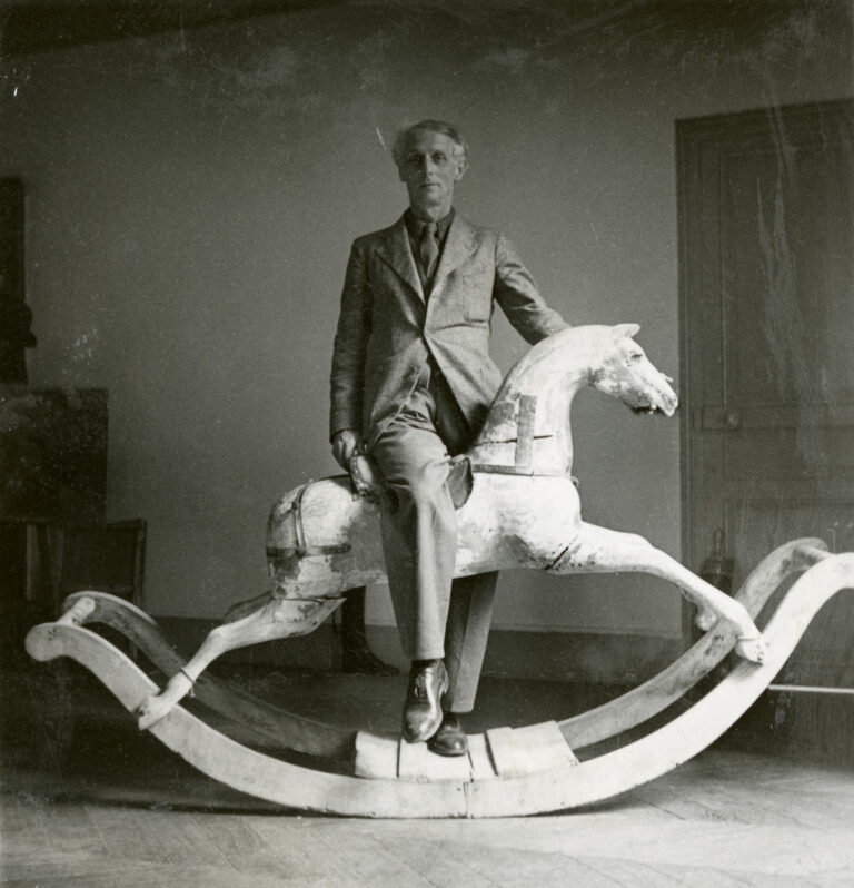 Max Ernst with rocking horse, Paris ,1938, Max Ernst Museum Brühl des LVR, Stiftung Max Ernst