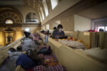 Two refugees resting in the church, ph. Maria Feck