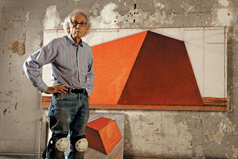Christo in his studio with a preparatory drawing for The Mastaba, 2012. Photo: Wolfgang Volz © 2012 Christo