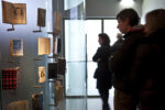 Visitors looking at scale models of the Secret Annex © Anne Frank House. Photographer Cris Toala Olivares