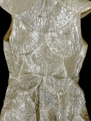 Cellulose acetate evening coat (detail), designed by Alix, Paris, 1936 © Victoria and Albert Museum, London