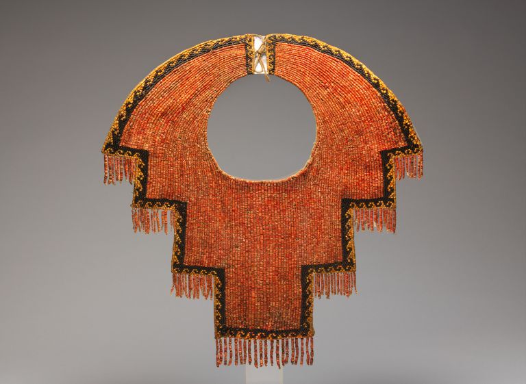 Collar 12th–14th century Peru, Chimú Spondylus shell and black stone beads, cotton, The Metropolitan Museum of Art, Purchase, Nathan Cummings Gift and Rogers Fund, 2003