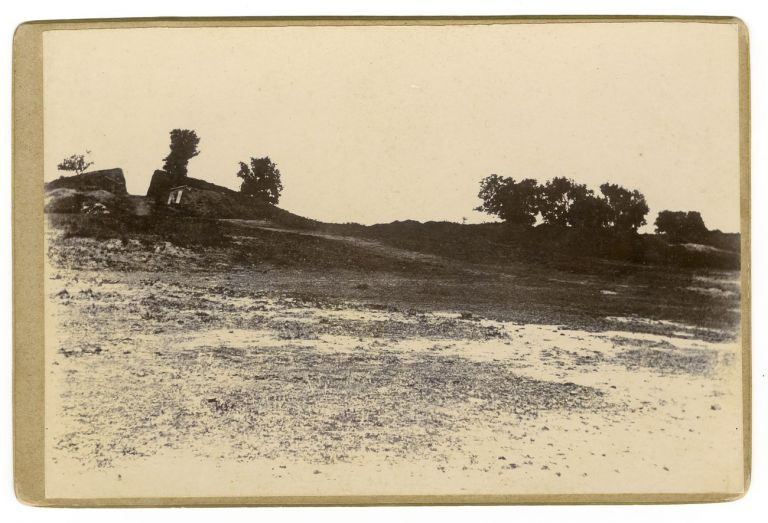 The stupa of Piprahwa Excavation down the middle of the mound. Photography: © Peppé family