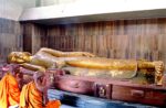 Monks in the Parinirvana temple of Kushinagar, India. Photography: © Benoy K. Behl