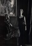Marella Agnelli, wearing an emerald velvet dress by Dior, in front of a Picasso and an 18th c. sculpture of a monkey. Photo by Henry Clarke.