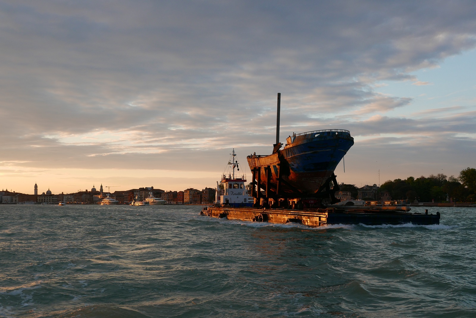 Christoph Büchel, Barca Nostra, Venezia, 2019. The migrant shipwreck of 18 April 2015 being transported from the Pontile Marina Militare di Melilli (NATO) to the Arsenale in Venice, Italy. Photo © BARCA NOSTRA