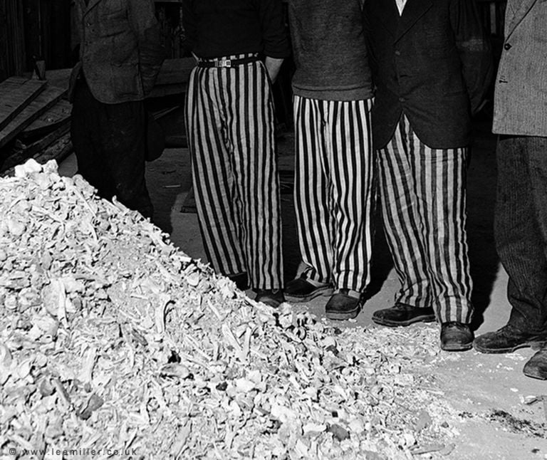 Lee Miller, Released prisoners in striped prison dress © Lee Miller Archives England 2018. All Rights Reserved. www.leemiller.co.uk