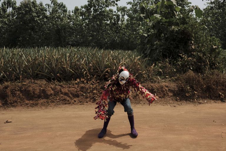 Francesco Bellina, The mask called “Caleta”, rappresents the new year. The masque represents the mistery of the new year coming and wishes for what has to come. He dances followed by the public during the Voodoo Festival. Allada, Benin 2018