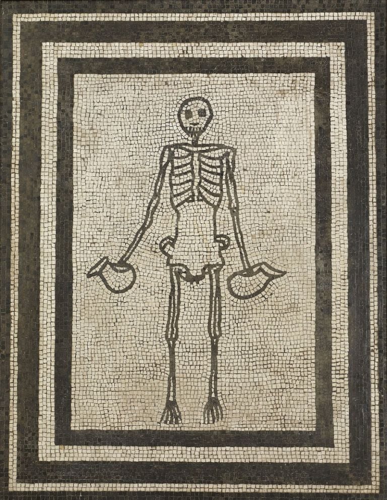 Monochrome mosaic panel of a skeleton holding two wine jugs AD 1–50Pompeii, House of the Vestals (c) Museo Archeologico Nazionale di Napoli