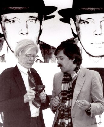 Andy Warhol and Bernd Klüser, 1980, during the exhibition Beuys by Warhol. Photo Angela Neuke. Courtesy Galerie Klüser
