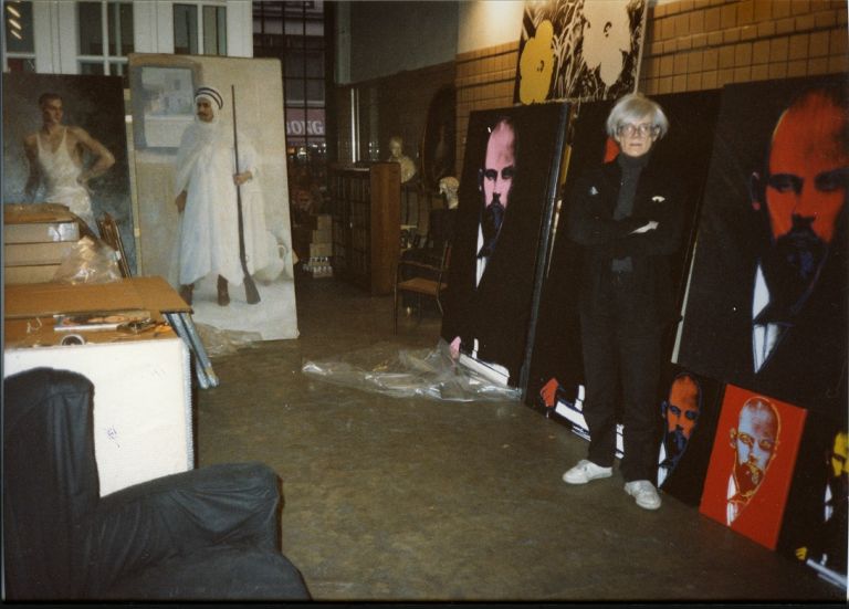 Andy Warhol in front of the Lenin works at his Factory, February 1987, copyright Galerie Klüser
