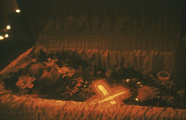 Nan Goldin, Cookie in her Casket, NYC, 1989. The Cookie Mueller Portfolio, 1976 1989. Archival pigment print. Courtesy the artist and Marian Goodman Gallery, New York, Paris and London