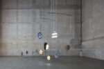 Cerith Wyn Evans, C=O=N=S=T=E=L=L=A=T=I=O=N (I call your image to mind), 2010. Installation view at Pirelli HangarBicocca, Milano 2019. Courtesy of the artist, Maja Hoffmann-Luma Foundation & Pirelli HangarBicocca. Photo Agostino Osio