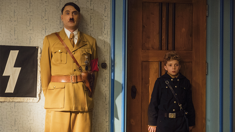 Taika Waititi and Roman Griffin Davis in the film JOJO RABBIT. Photo by Kimberley French. © 2019 Twentieth Century Fox Film Corporation All Rights Reserved