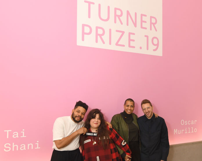 MARGATE, ENGLAND - DECEMBER 03: Turner Prize 2019 nominees, (L-R) Oscar Murillo, Tai Shani, Helen Cammock and Lawrence Abu Hamdan pose for a portrait ahead of the Evening Drinks Reception before the winner of Turner Prize 2019 is announced by Edward Enniful, Editor in Chief of British Vogue on December 03, 2019 in Margate, England. (Photo by Stuart C. Wilson/Stuart Wilson/Getty Images for Turner Contemporary) - detail