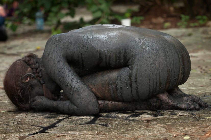 Regina Josè Galindo, Piedra, 2013, Sao Paolo, Brazil, glossy print on forex, 90 x 135 cm, Photo credit Julio Pantoja, Marlene Ramírez-Cancio, courtesy The artist and prometeogallery Milan:Lucca