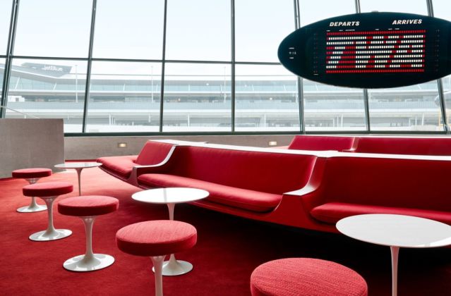 The Sunken Lounge at the TWA Hotel features its original Chili Pepper Red carpet and authentic penny tile. Photo credits TWA Hotel – David Mitchell
