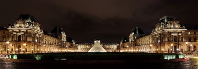 Louvre at night via Wikipedia