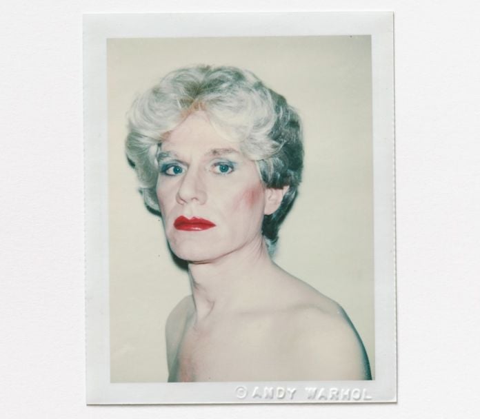 Andy Warhol, Self Portrait in Drag, 1981, Polacolor 2 © 2020 The Andy Warhol Foundation for the visual Arts, Inc. Licensed by DACS London. Courtesy BASTIAN London.