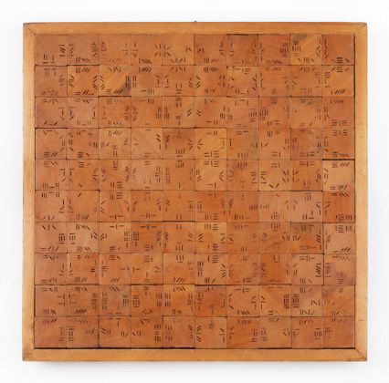 Alighiero Boetti, Dama, 1967-1968, carved wood, 21 1/4 x 21 1/4 x 2 3/8 in. (54 x 54 x 6 cm). Photo by Marco Anelli. Courtesy the Olnick Spanu Collection