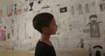 Notturno a fim by Gianfranco Rosi il bambino Fawaz senza parole davanti ai disegni dei bambini che raccontano gli orrori dell’Isis