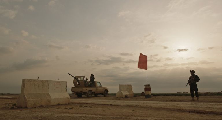 Notturno a film by Gianfranco Rosi .Check Point confine Siria Iraq