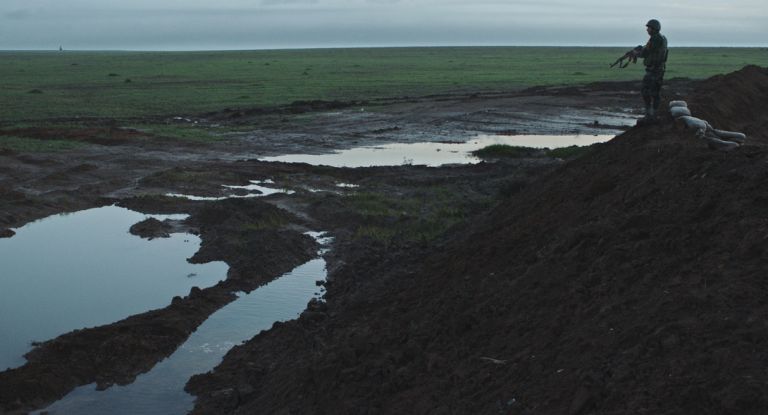 Notturno a film by Gianfranco Rosi. Sentinella sulla linea di confine tra Kurdistan e Iraq