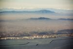 Barcelona with pollution. Photo © Jon Tugores