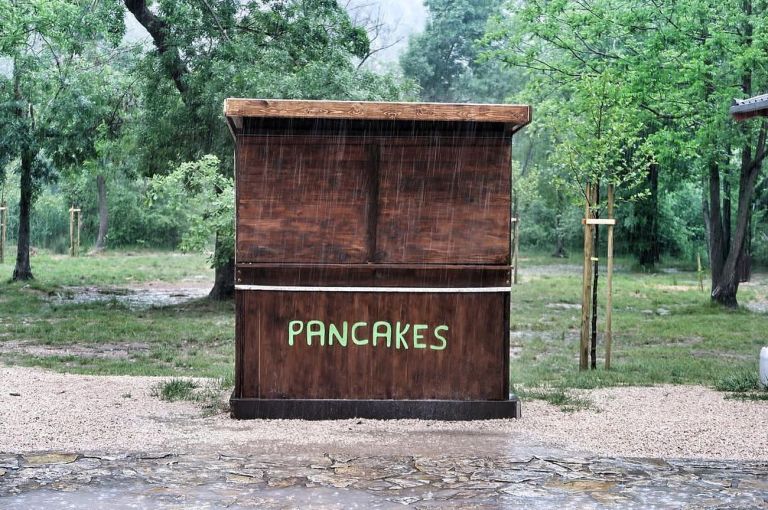 Pancakes Stand, Krka National Park, Croatia, 1985 ca. Photo credit Cathy Tideswell. Courtesy Accidentally Wes Anderson