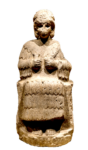 Statue of a goddess found in Susa with inscriptions of Puzur Shushinak (ca. 2150 BC) written in Linear Elamite and cuneiform writings; Louvre Museum