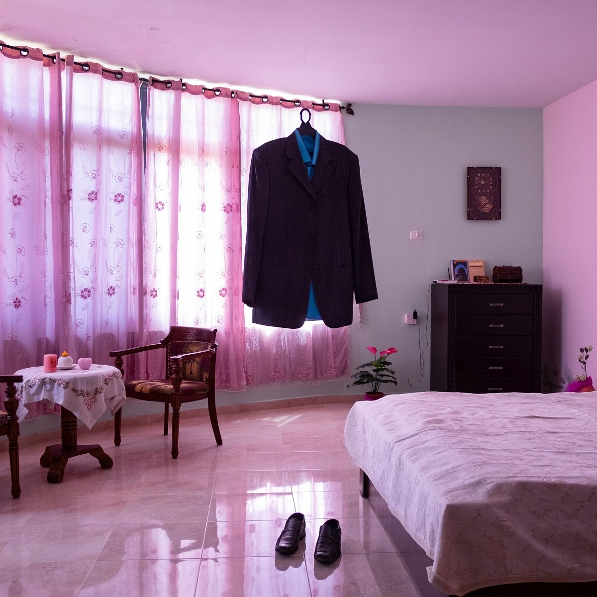 Habibi © Antonio Faccilongo, Italy, Getty Reportage. Nael al-Barghouthi’s suit remains hanging in his bedroom in Kobar, near Ramallah, Palestine, on 17 August 2015. Al-Barghouthi’s wife, Iman Nafi, keeps all her husband’s clothes and belongings in place. Al-Barghouthi was arrested in 1978 after an anti-Israel commando operation. He was released in 2011, married Iman Nafi, but re-arrested in 2014 and sentenced to life imprisonment. He has spent more than 40 years in prison—the longest-serving Palestinian inmate in Israeli jails.