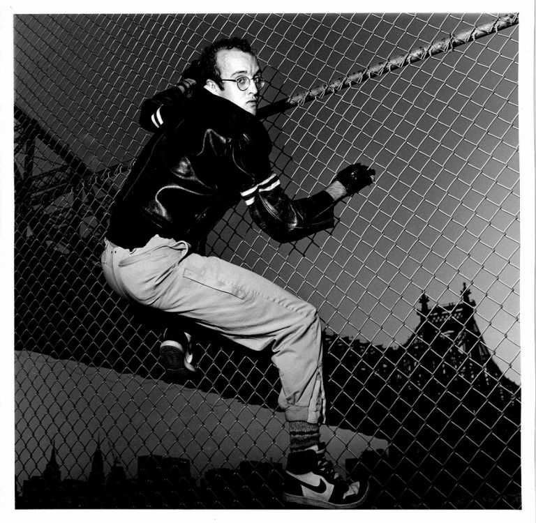 Gianfranco Gorgoni, Keith Haring in Front of Queens Bridge, NYC 1985