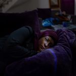 Antonio Faccilongo, Beit Rima (Palestine), 20/12/2018. Lydia lying on a sofa in her home. She is Majd's mother, who was born thanks to in vitro fertilization. Lydia’s husband, Abdel Karim, has been arrested since June 2001 and sentenced to 25 years for involvement in the 2001 murder of Israeli Tourism Minister Rehavam Zeevi. This photo shows the loneliness of a woman who alone has to face all the difficulties of life, and the sadness that pervades these women for the absence of their husbands. I've known Lydia and her family for a long time. I had been invited for a lunch and in this occasion I took this portrait.