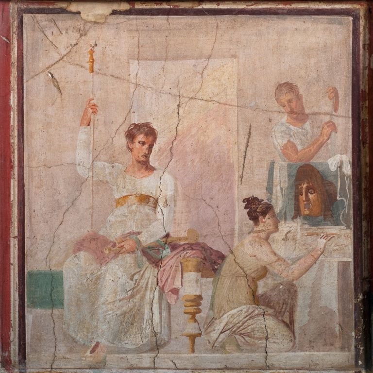 Fresco of a seated actor dressed as a king and female figure with a small painting of a mask, Italy, AD 30–40. With permission of the Ministero della Cultura ̶ Museo Archeologico Nazionale di Napoli