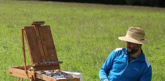 Ben Quilty paints a landscape at Sutton Forest which would be impacted if Hume Coal's project goes ahead.