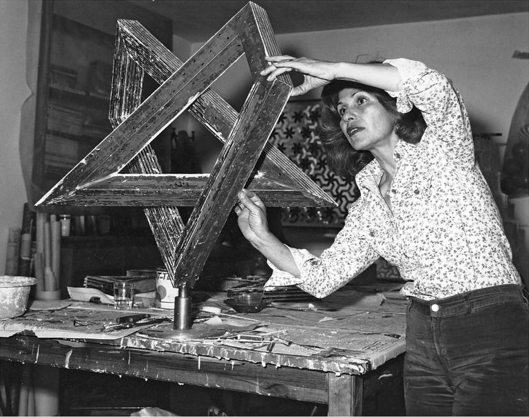 Monir Shahroudy Farmanfarmaian in her studio, working on Heptagon Star, Tehran, 1975. Estate of Monir Shahroudy Farmanfarmaian