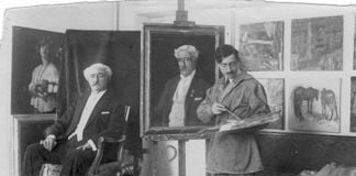 Carlo Romagnoli al lavoro nel suo studio, 1920 ca.