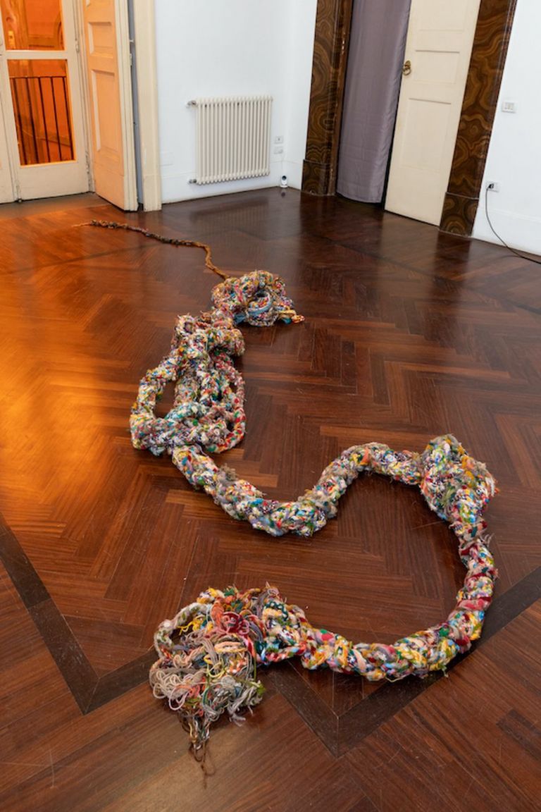 Oscar Santillán, Codex (A Thousand Year of Nonlinear History), 2021, installation, mixed fabrics 13x13x1300 cm. Courtesy the artist & Galleria Tiziana Di Caro. Photo Danilo Donzelli