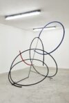 Stefano Comensoli_Nicolò Colciago, Acrobazia (Sigillo_12), 2021, Steel pipe, polyethylene pipe, medium voltage cable, 240x230x230 cm. Courtesy the artists