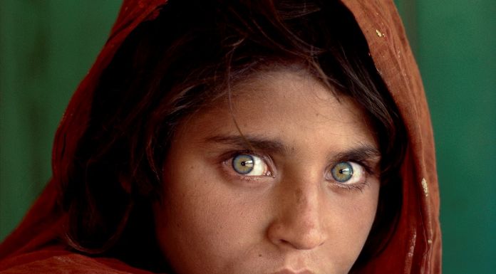 Sharbat Gula, Afghan Girl, at Nasir Bagh refugee camp near Peshawar, Pakistan, 1984.