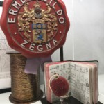 © Photo Dario Bragaglia, Trivero (Biella). Percorso espositivo di Casa Zegna. Il famoso sigillo di garanzia e uno dei taccuini su cui Ermenegildo Zegna prendeva appunti