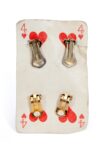 Erik Kessels & Thomas Mailaender, Europe Archive, 2021. Four ff Hearts Playing Card Holding Four Clip On Earrings