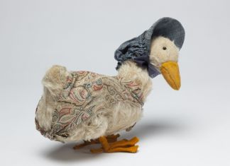 Soft toy, mohair, felt and glass, 'Jemima Puddle Duck', made by J K Farnell & Co Ltd, England, ca. 1925. Courtesy of Frederick Warne & Co