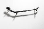 Alex Pinna, Equilibrio, 2004, bronzo patinato, cm 8x3x20
