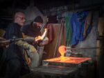 The glassmakers team at work while making Vera Molnár’s “Icône 2020” in the furnace, Murano, Venice, 2020. Photo by Andrea Perotta ©, Courtesy New Murano Gallery