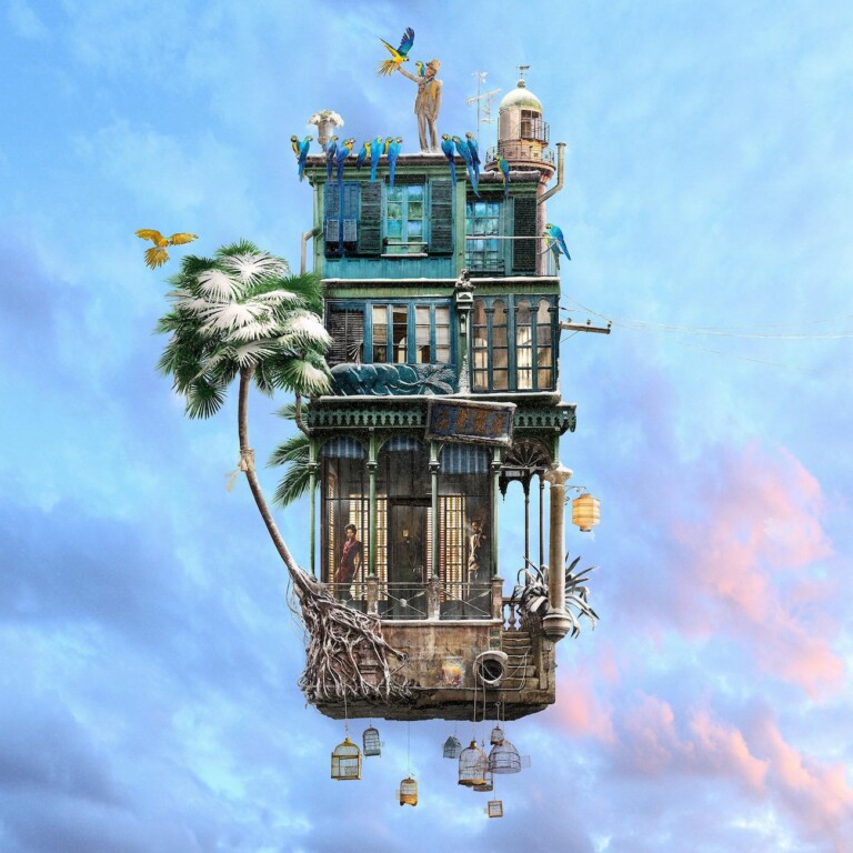 The Bird Charmer is part of the Flying Houses series by Laurent Chéhère, It's the end of Winter, this old green house stands out in this dead end Parisian alley. A palm tree hides it from prying eyes while elephants, the last vestiges of the infamous colonial exhibitions from the beginning of the 20th century, stand guard. Upstairs, the light hardly pierces the semi-darkness which seems to offer a refuge for a forbidden love story. On the roof, an old madman talks to the birds. Do they understand it?