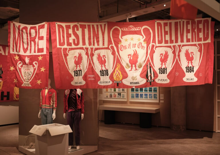 Installation photography featuring Destiny Delivered banner by Peter Carney and Carmel Gittens, 2005—2007. Felix Speller